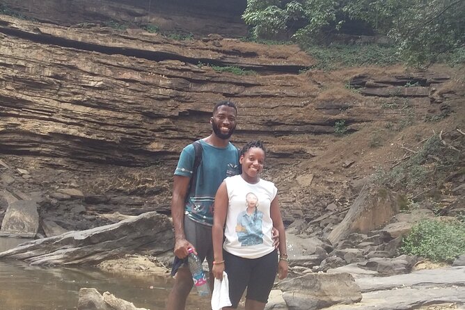 Experience Aburi Botanical Gardens And Boti Water Falls In A Day. - Swimming beneath the waterfall