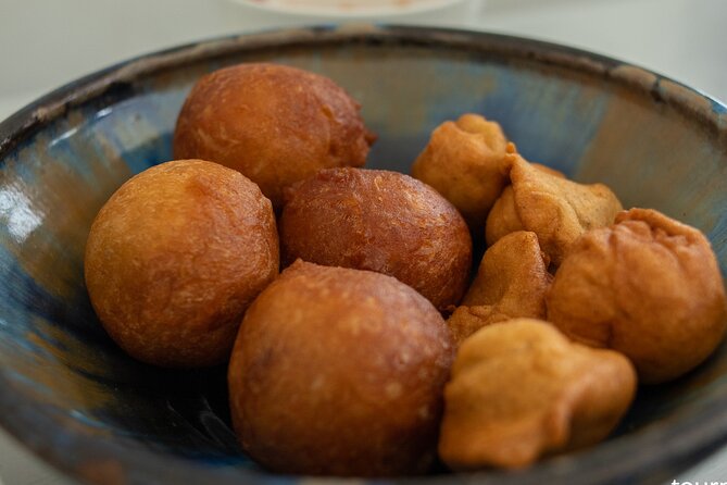 Private Full-Day Ghanaian Delicacy and Dessert Tour in Accra - Makola Market puts the ingredients in view